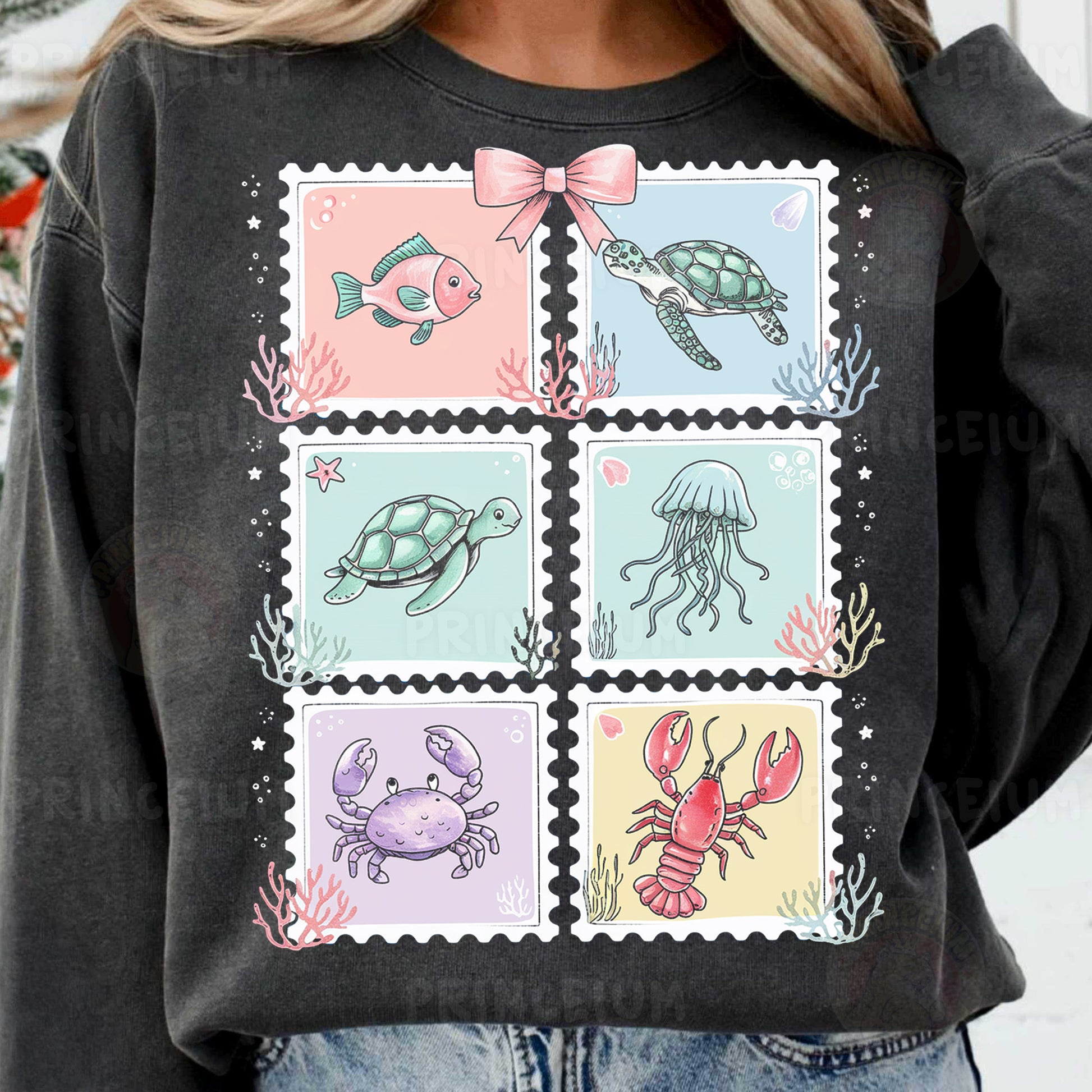 a woman wearing a black shirt with stamps on it