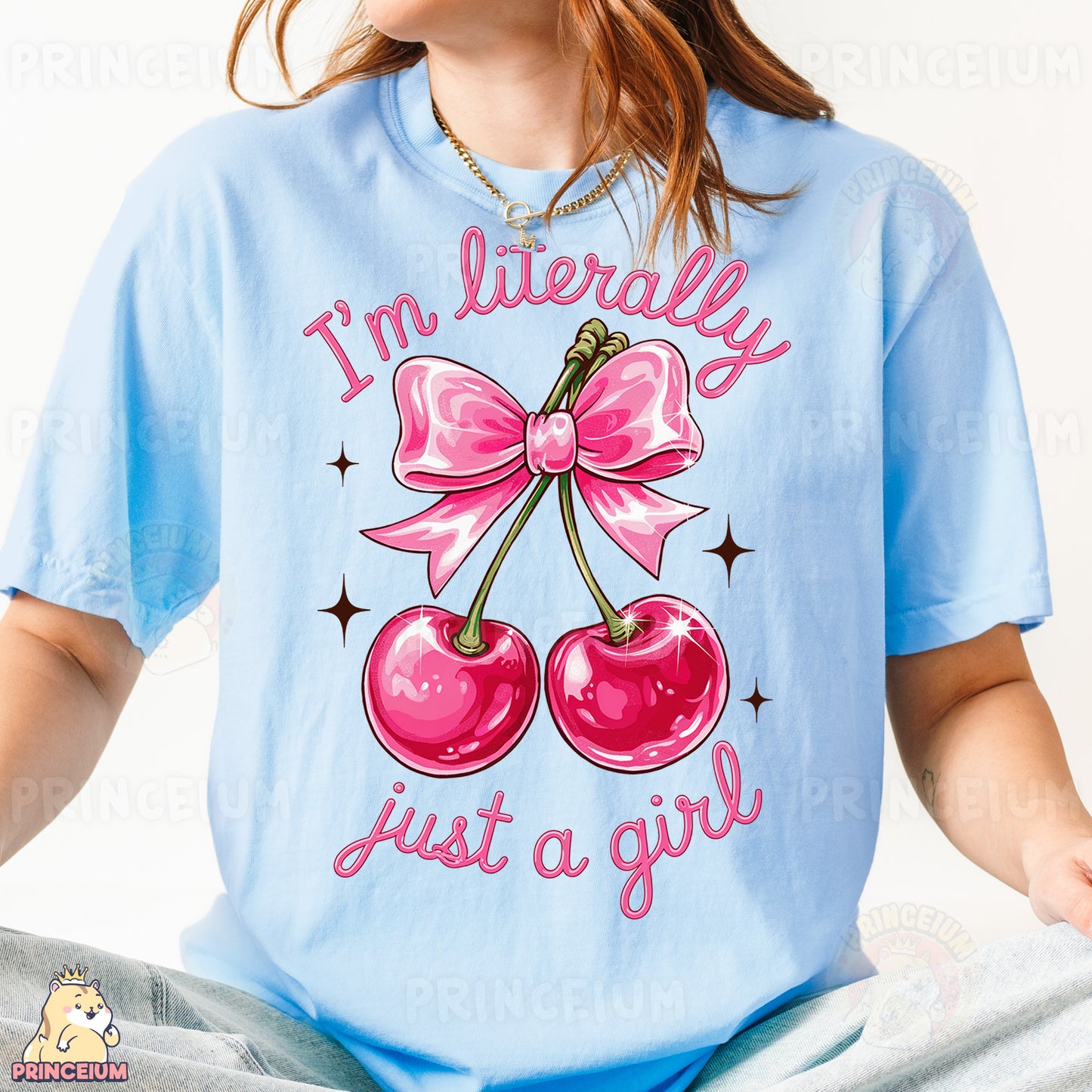 a woman wearing a blue shirt with a pink bow and two cherries on it