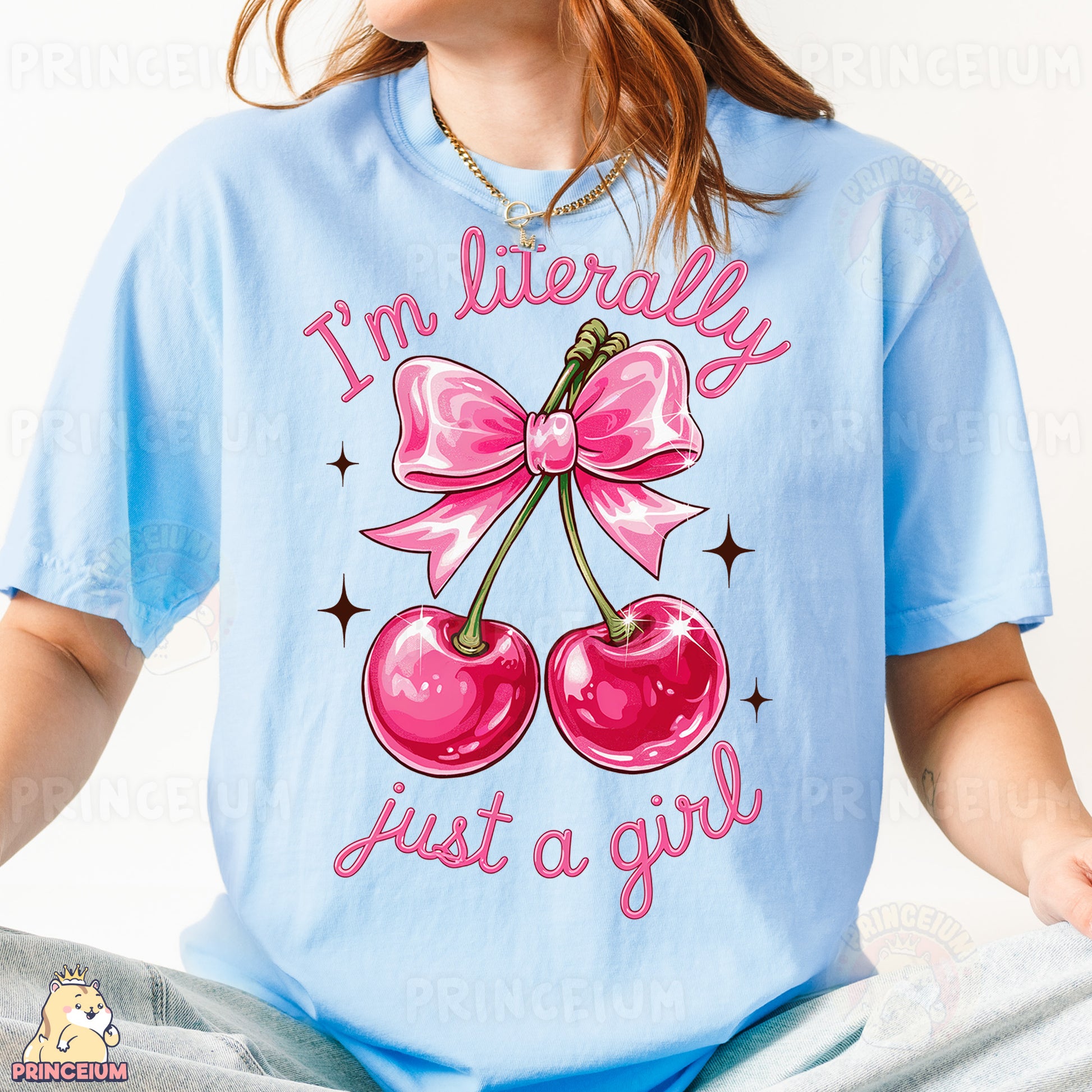 a woman wearing a blue shirt with a pink bow and two cherries on it