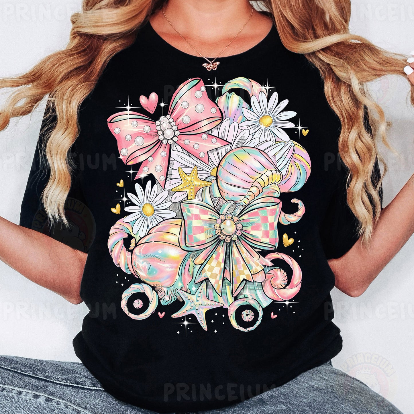 a woman wearing a black t - shirt with a bow and flowers on it