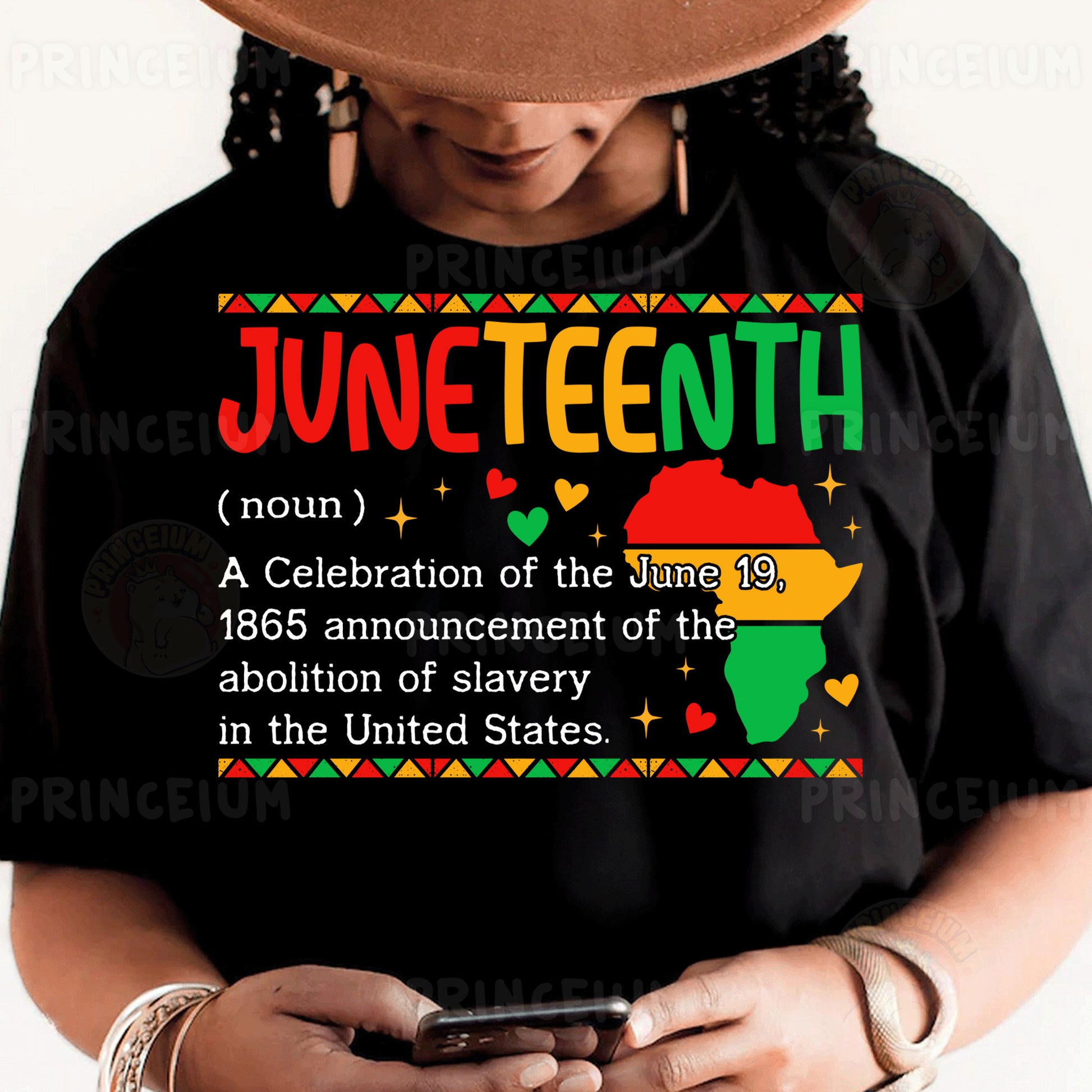 a person wearing a black shirt and a hat holding a cell phone