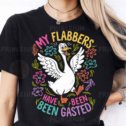 a woman wearing a black shirt with a white goose on it