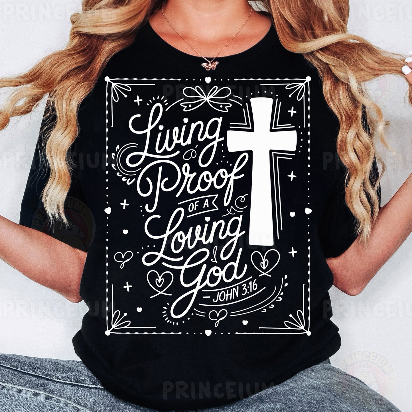 a woman wearing a black t - shirt with a cross on it