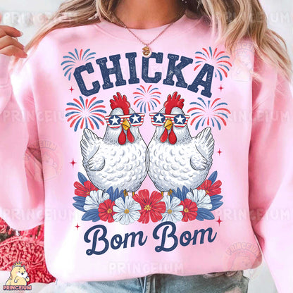 a woman wearing a pink sweatshirt with two chickens on it