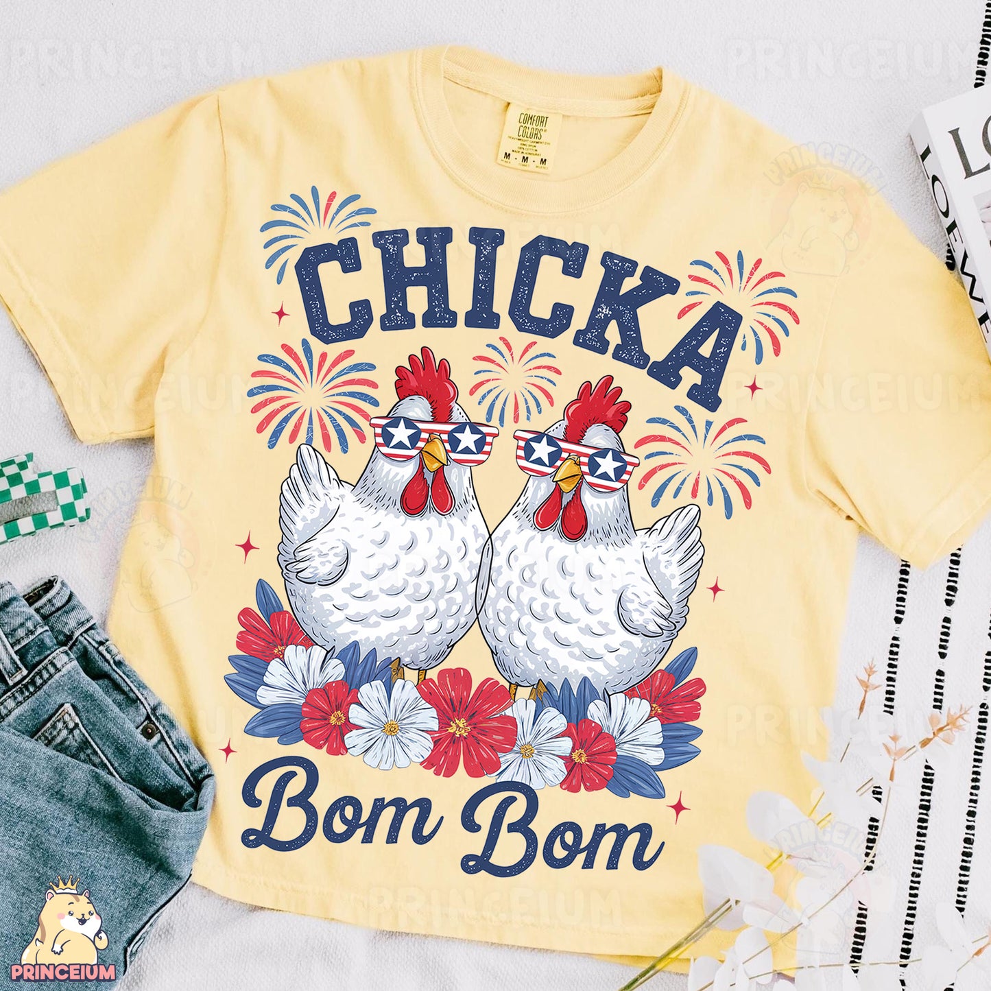 a yellow shirt with two chickens on it