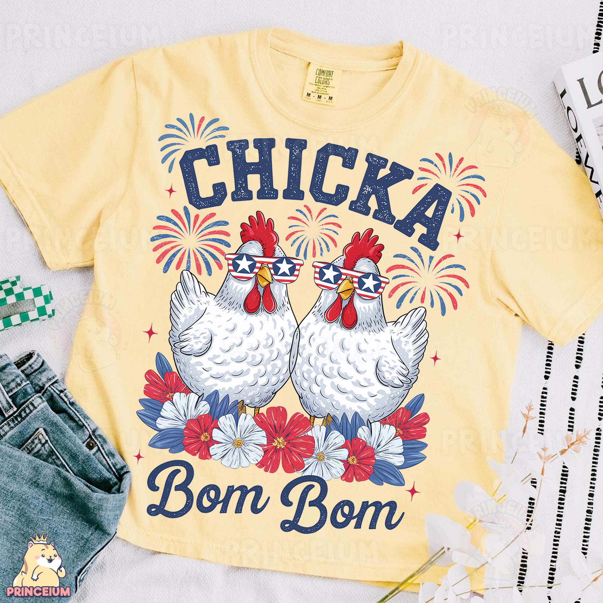 a yellow shirt with two chickens on it
