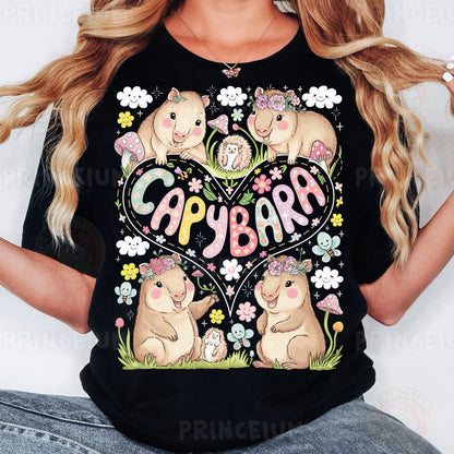 a woman wearing a black t - shirt with a picture of a couple of bears