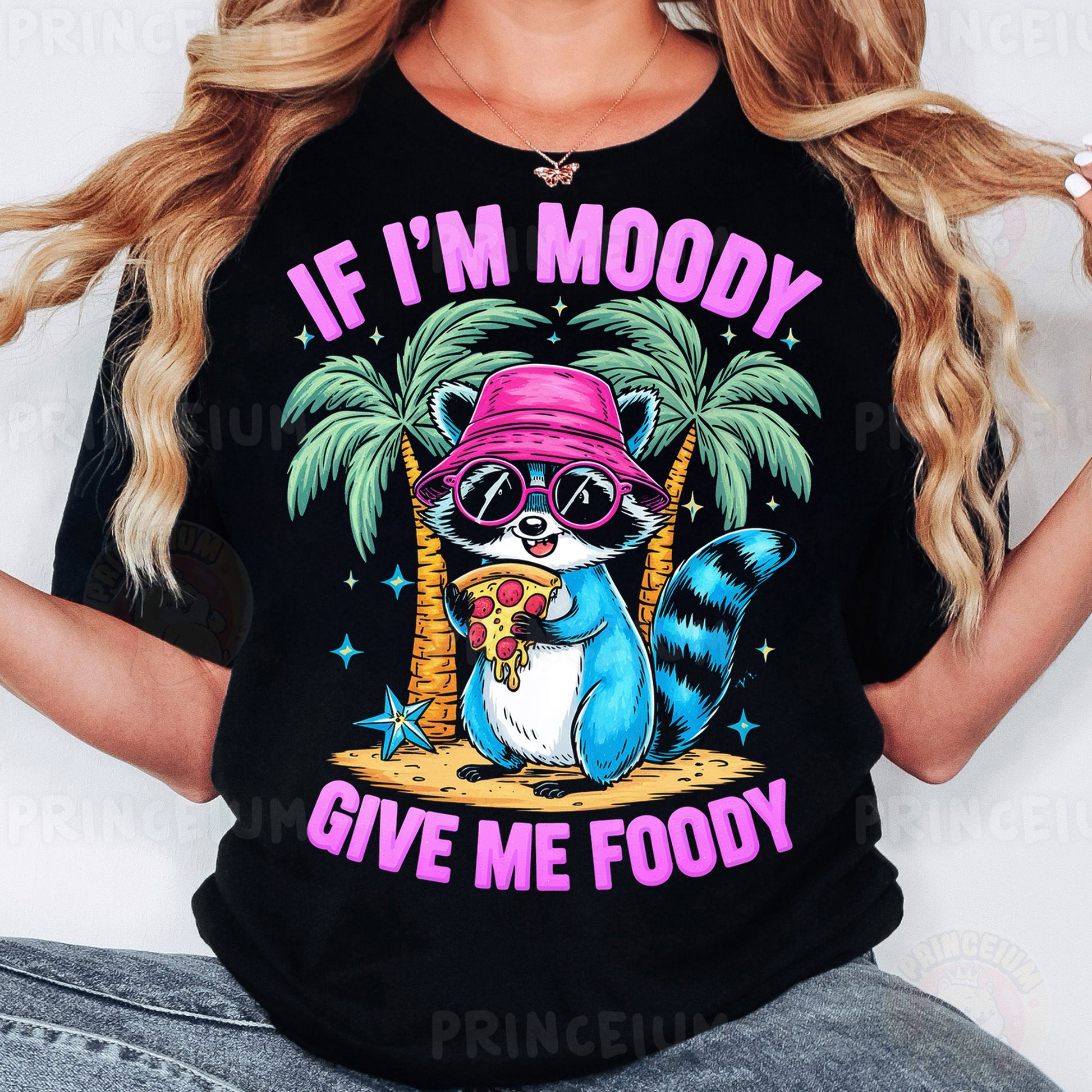 a woman wearing a black shirt with a raccoon wearing a pink hat and