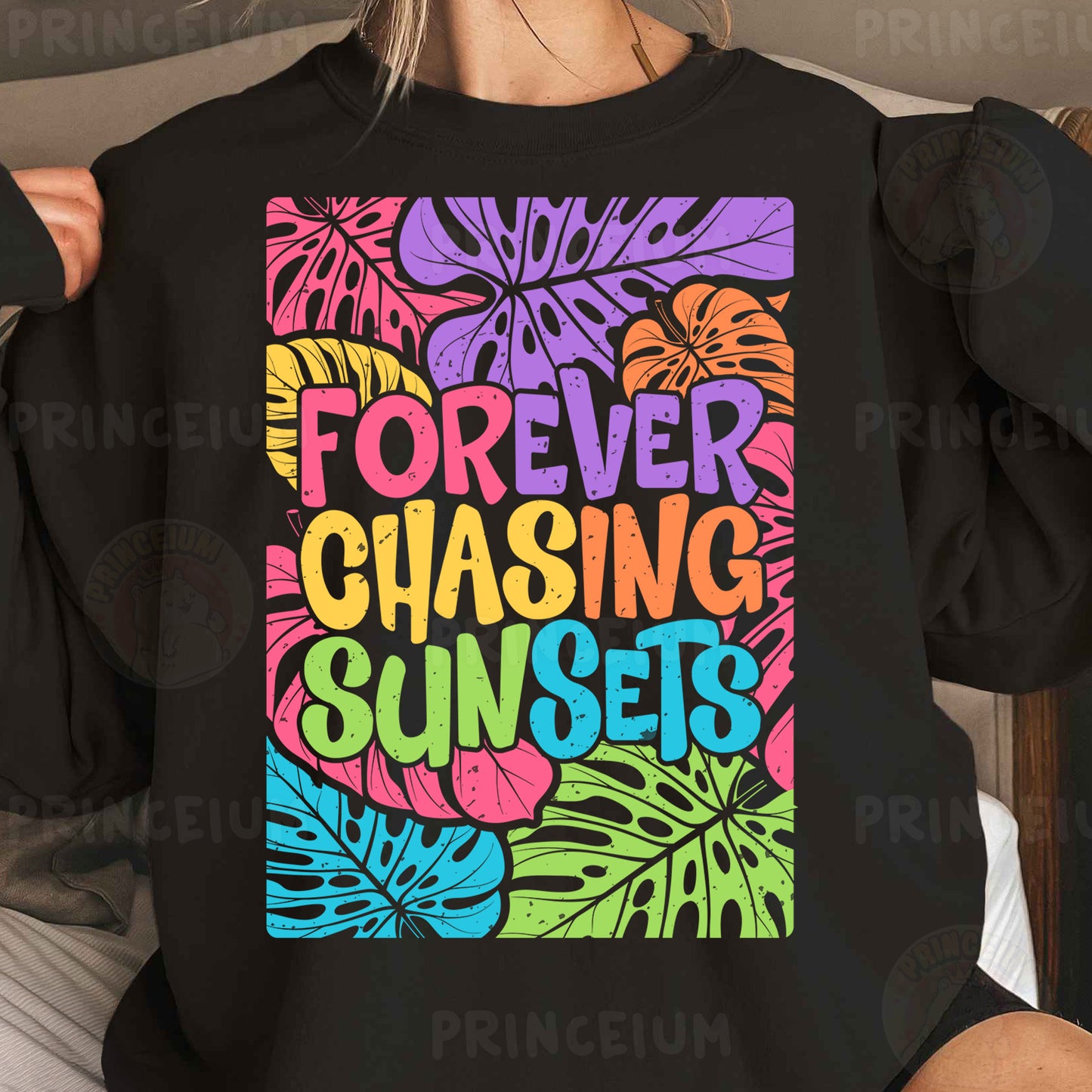 a woman wearing a black sweatshirt with colorful lettering