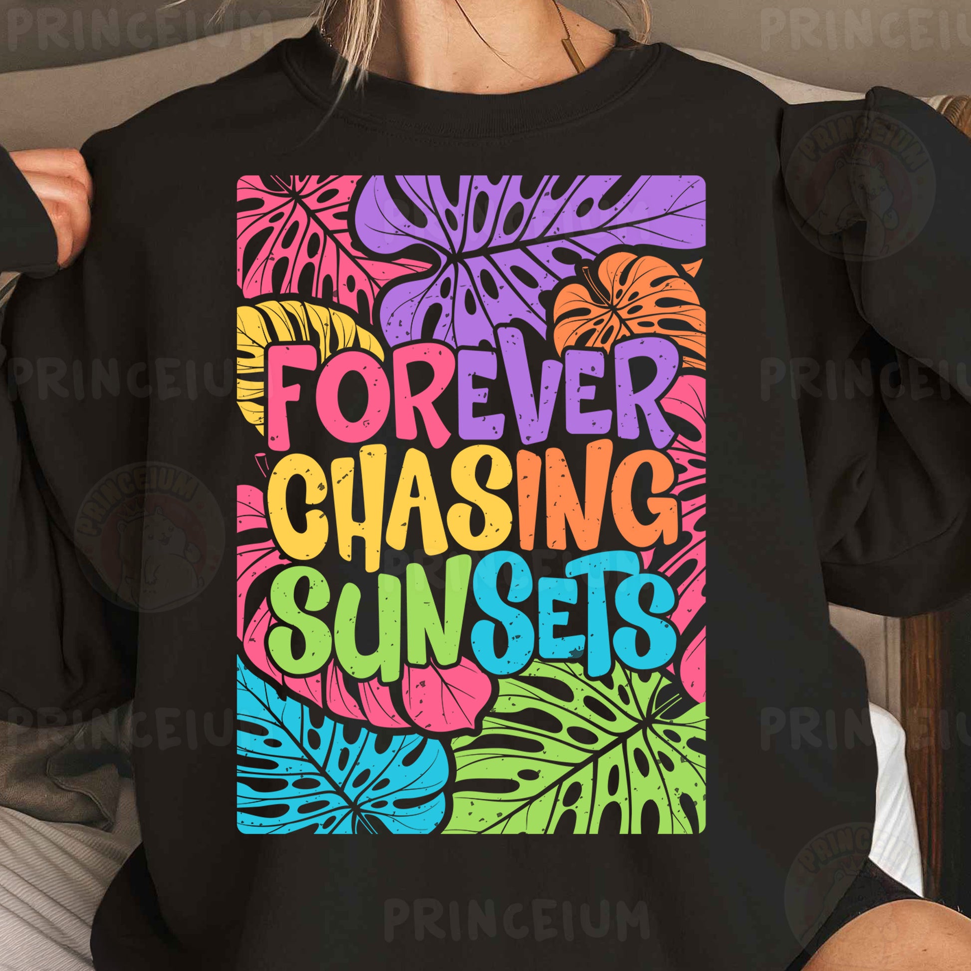 a woman wearing a black sweatshirt with colorful lettering