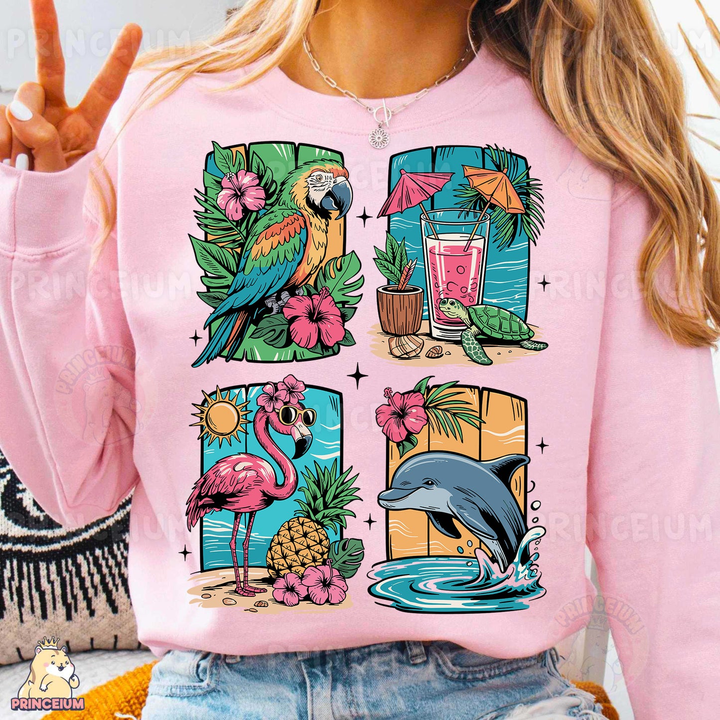 a woman wearing a pink shirt with a picture of a bird and a flamingo