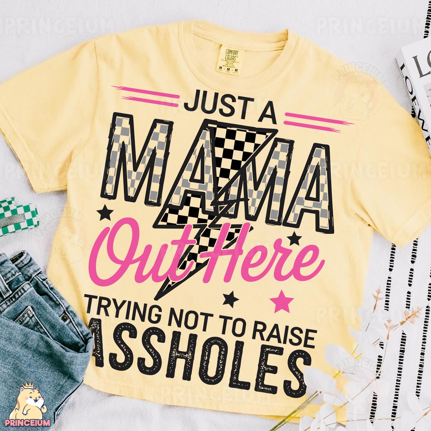 a t - shirt that says just a mama out there trying not to raise as