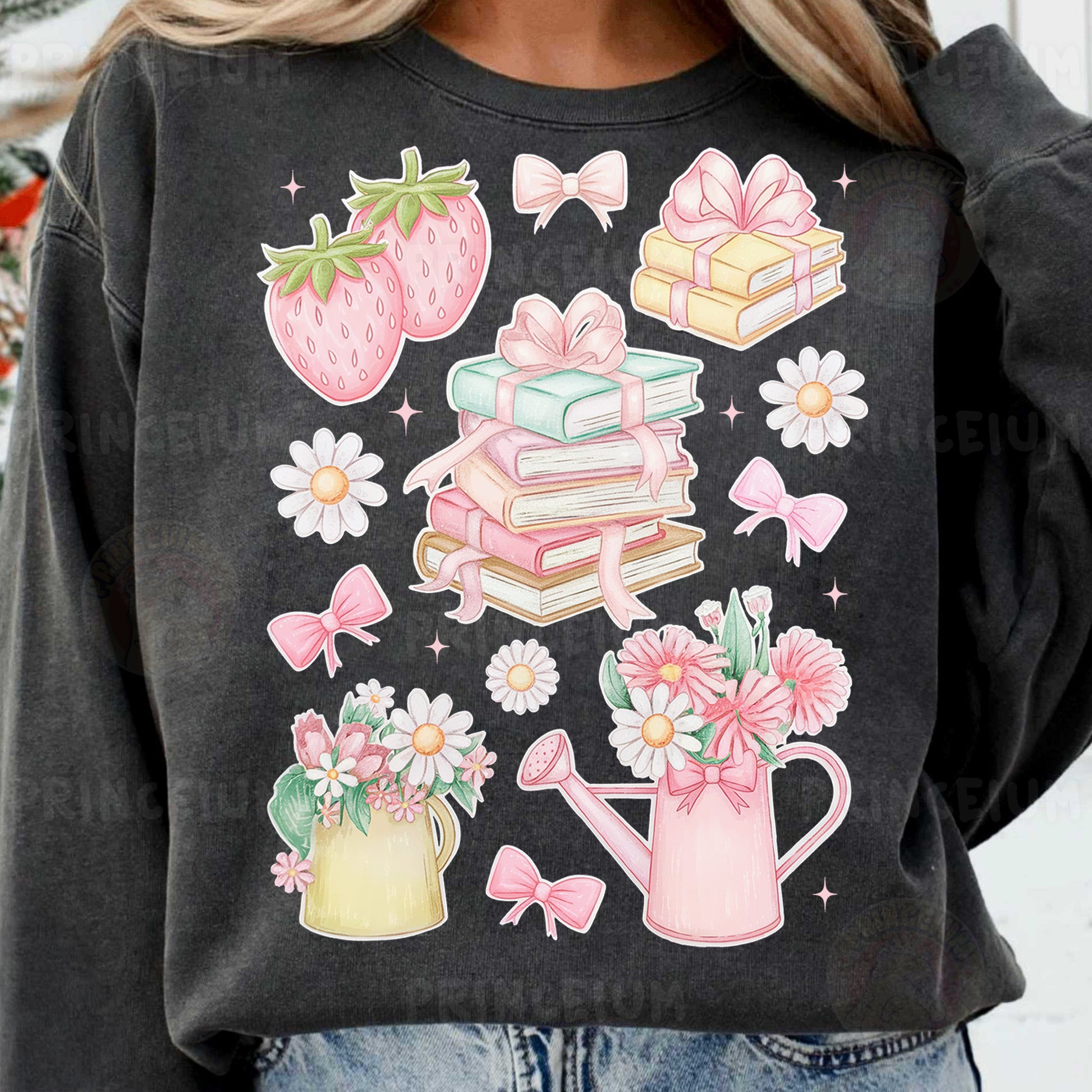 a woman wearing a black sweatshirt with pink flowers and books on it