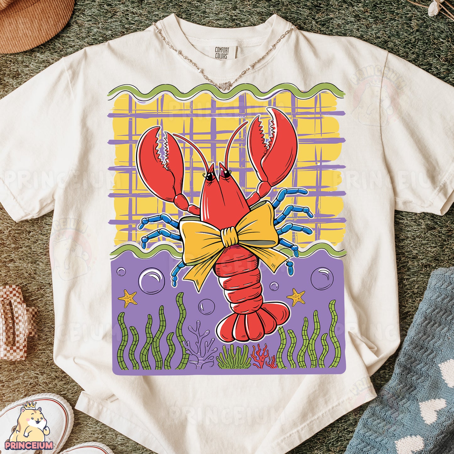 a t - shirt with a picture of a lobster on it