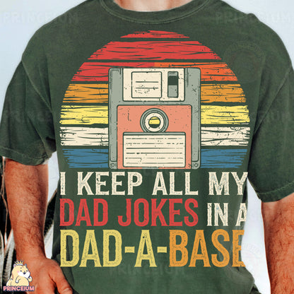 a man wearing a t - shirt that says i keep all my dad jokes in