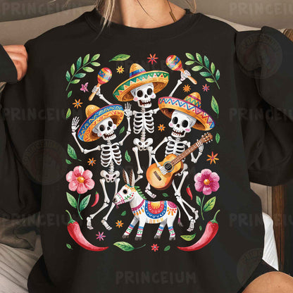 a woman wearing a black shirt with a mexican skeleton playing the guitar