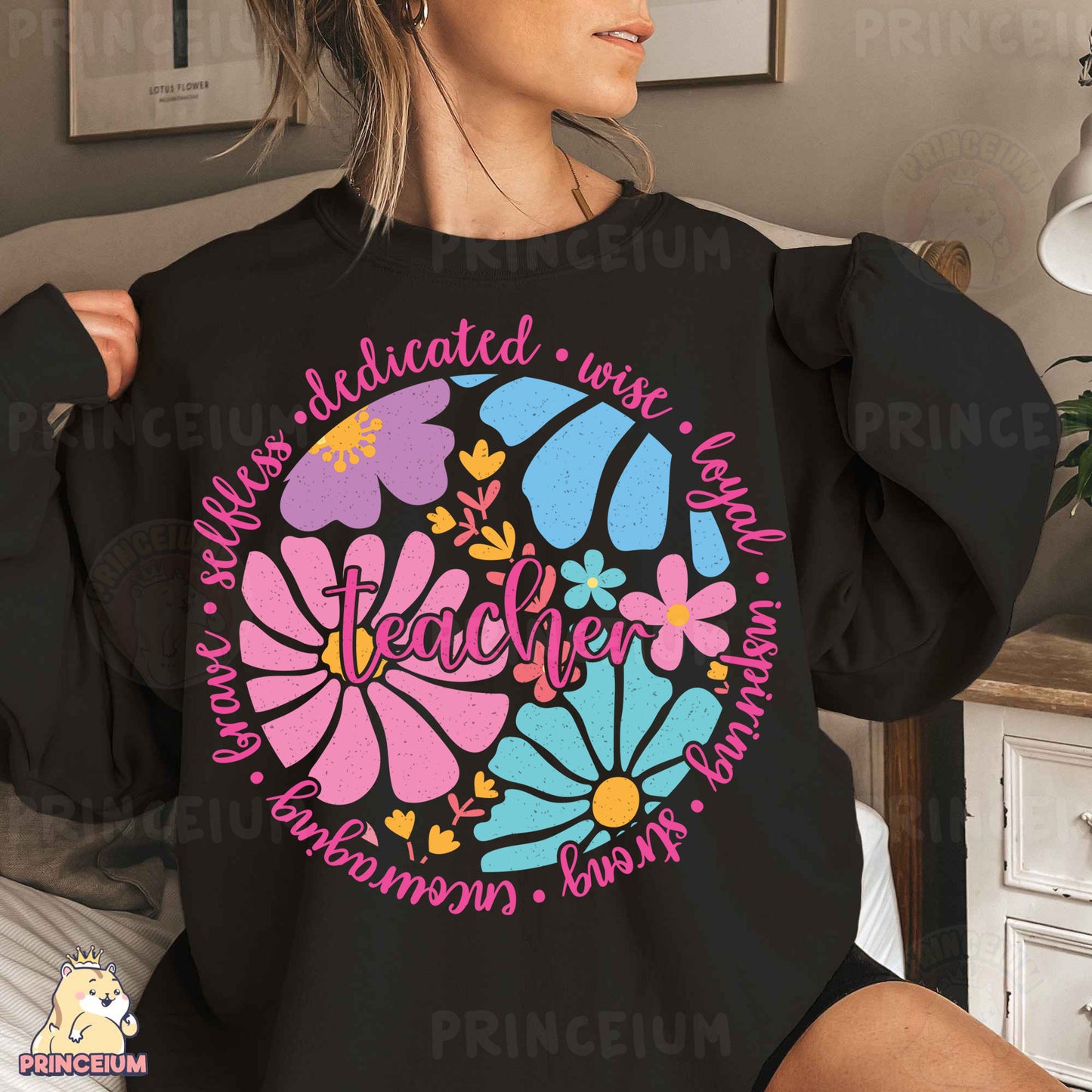 a woman wearing a black sweatshirt with colorful flowers on it