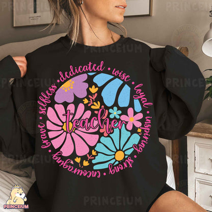 a woman wearing a black sweatshirt with colorful flowers on it