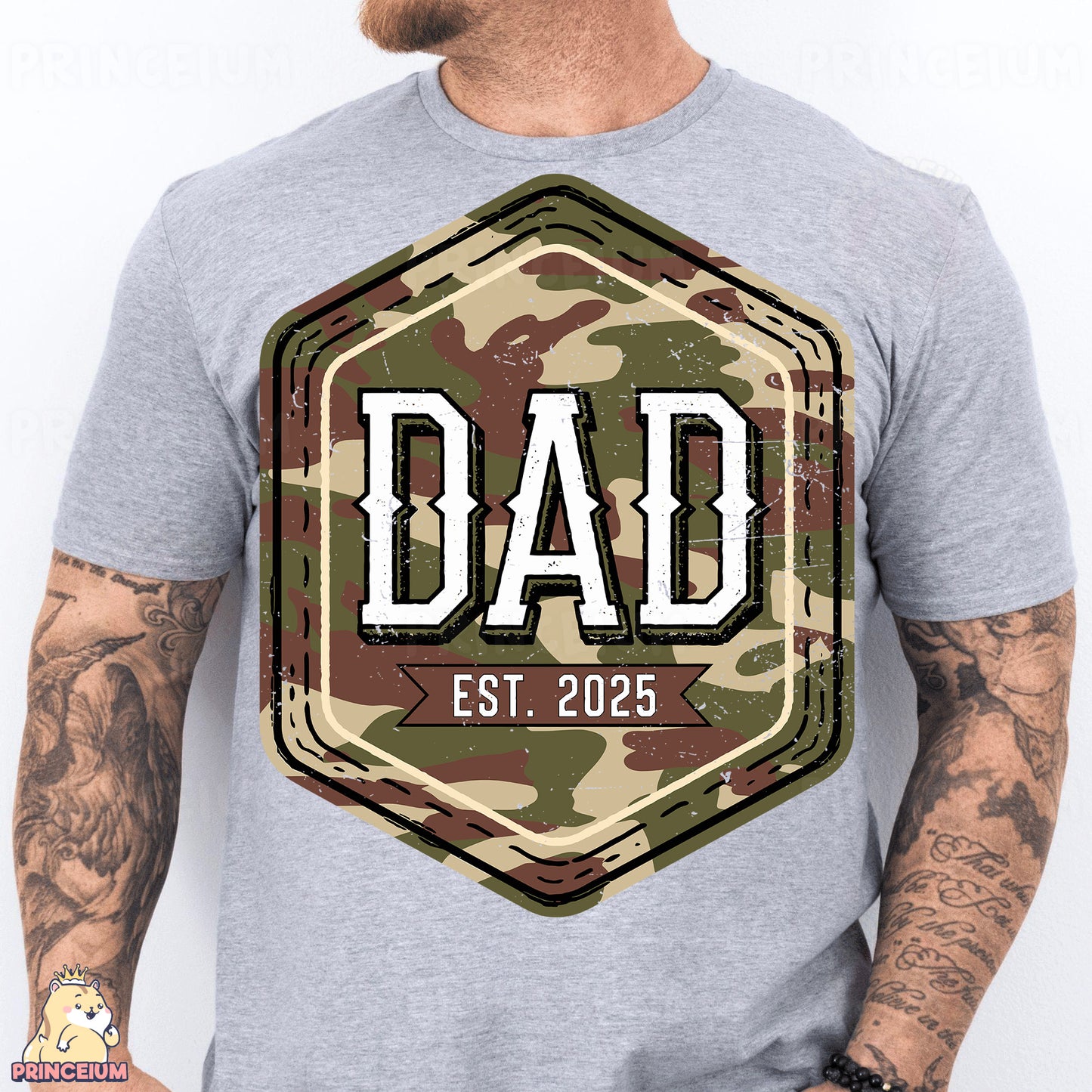 a man wearing a gray shirt with a camo print on it