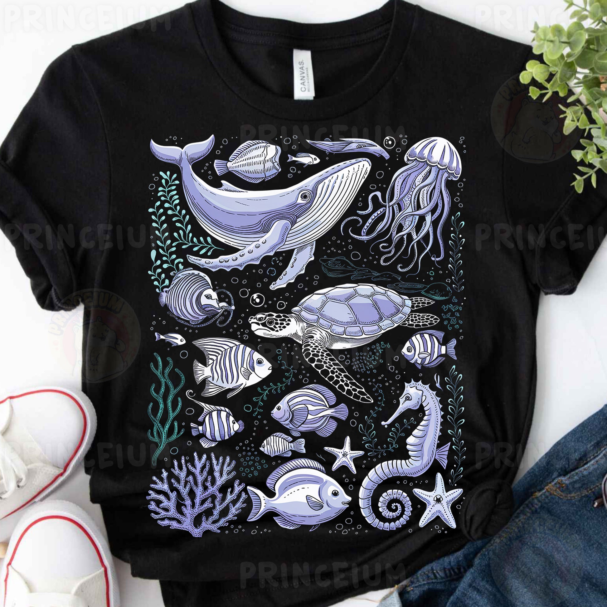 a t - shirt with a picture of a whale and other sea animals