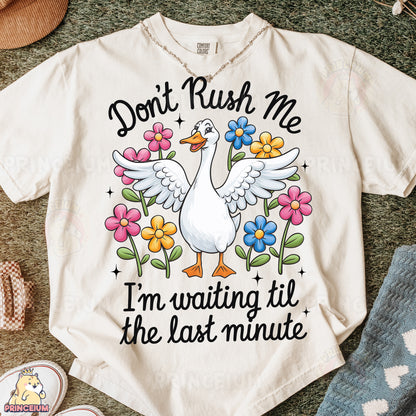 a white t - shirt that says, don't rush me i'm