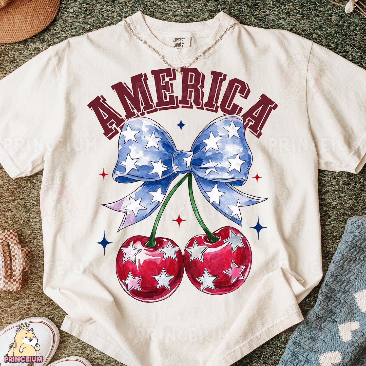 a white t - shirt with two cherries on it