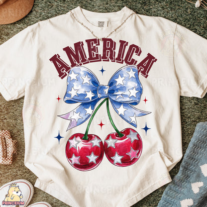 a white t - shirt with two cherries on it