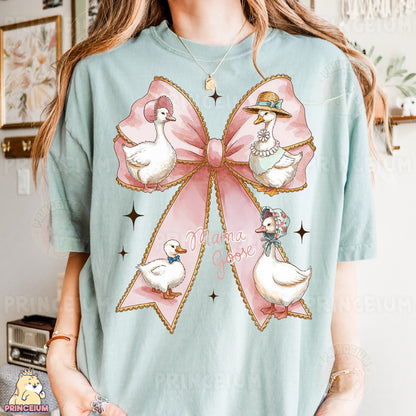 a woman wearing a t - shirt with ducks on it
