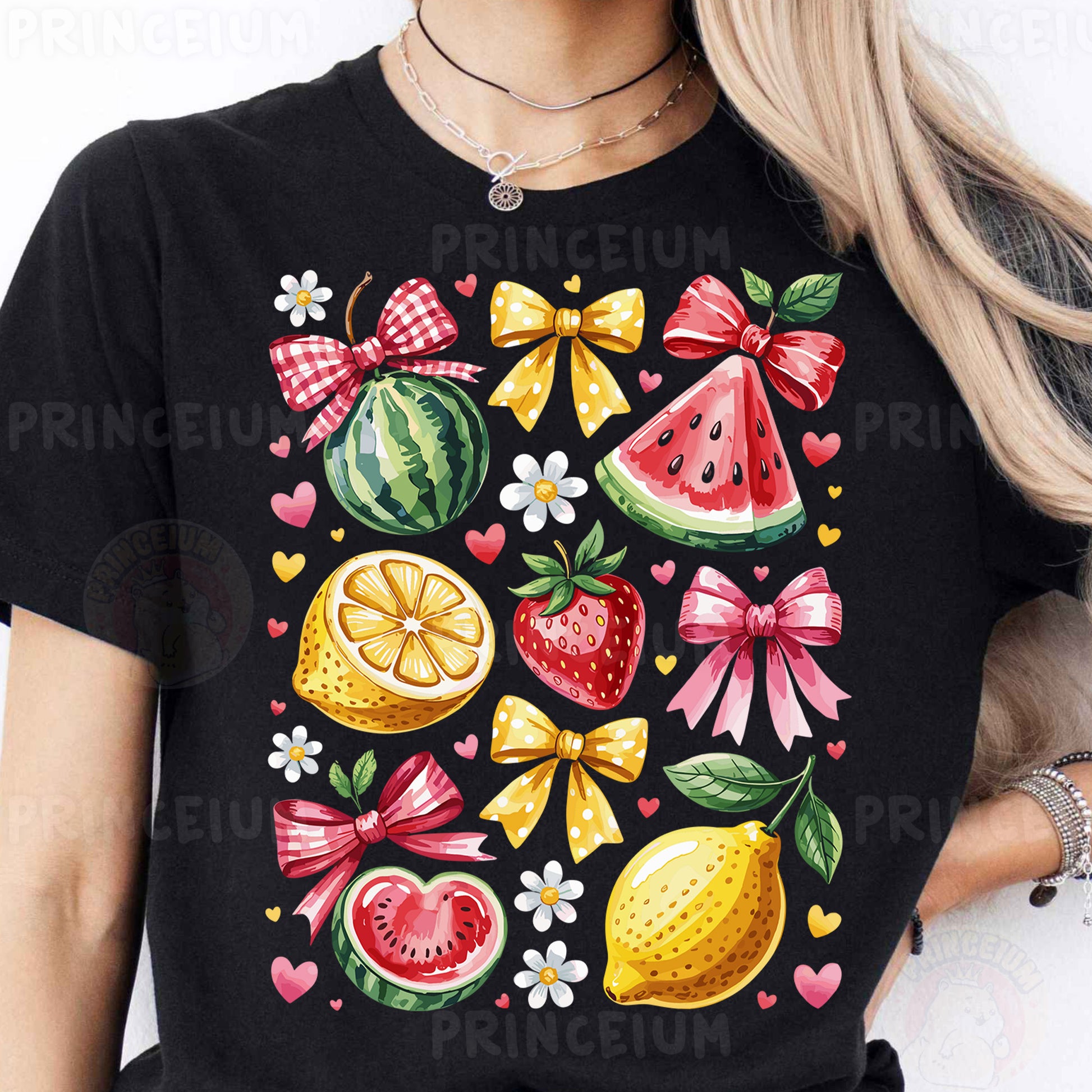 a woman wearing a black t - shirt with fruit and bows on it