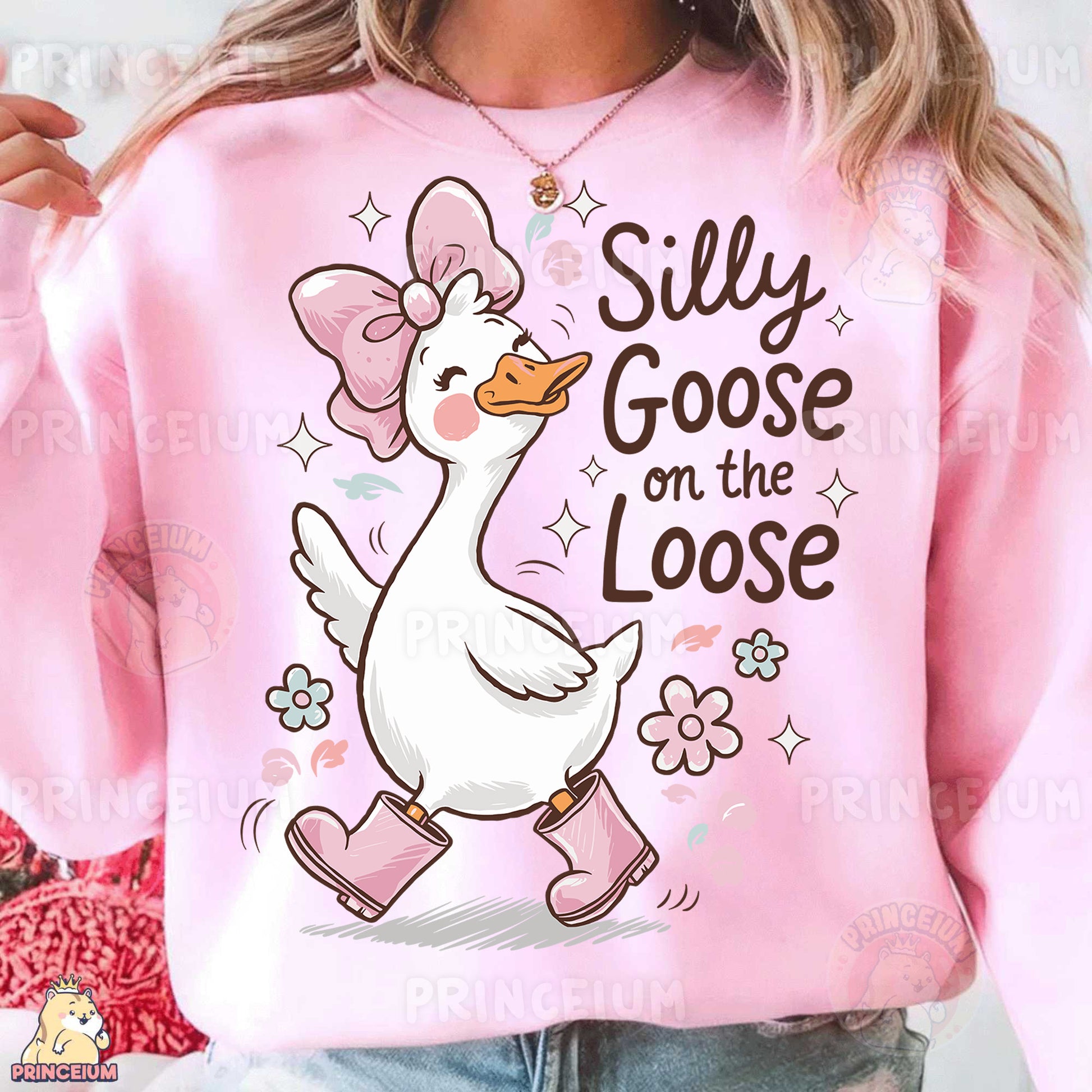 a woman wearing a pink shirt with a duck on it