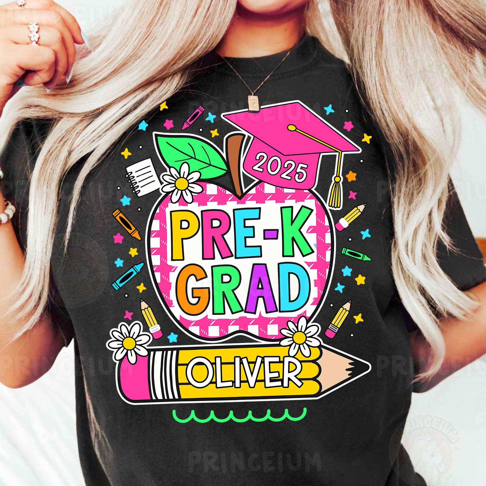 a woman wearing a black t - shirt with the words prek grad over