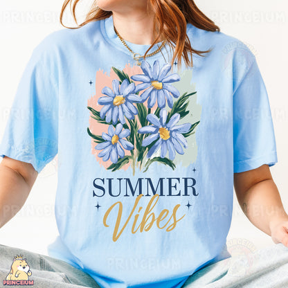 a woman wearing a blue shirt with flowers on it