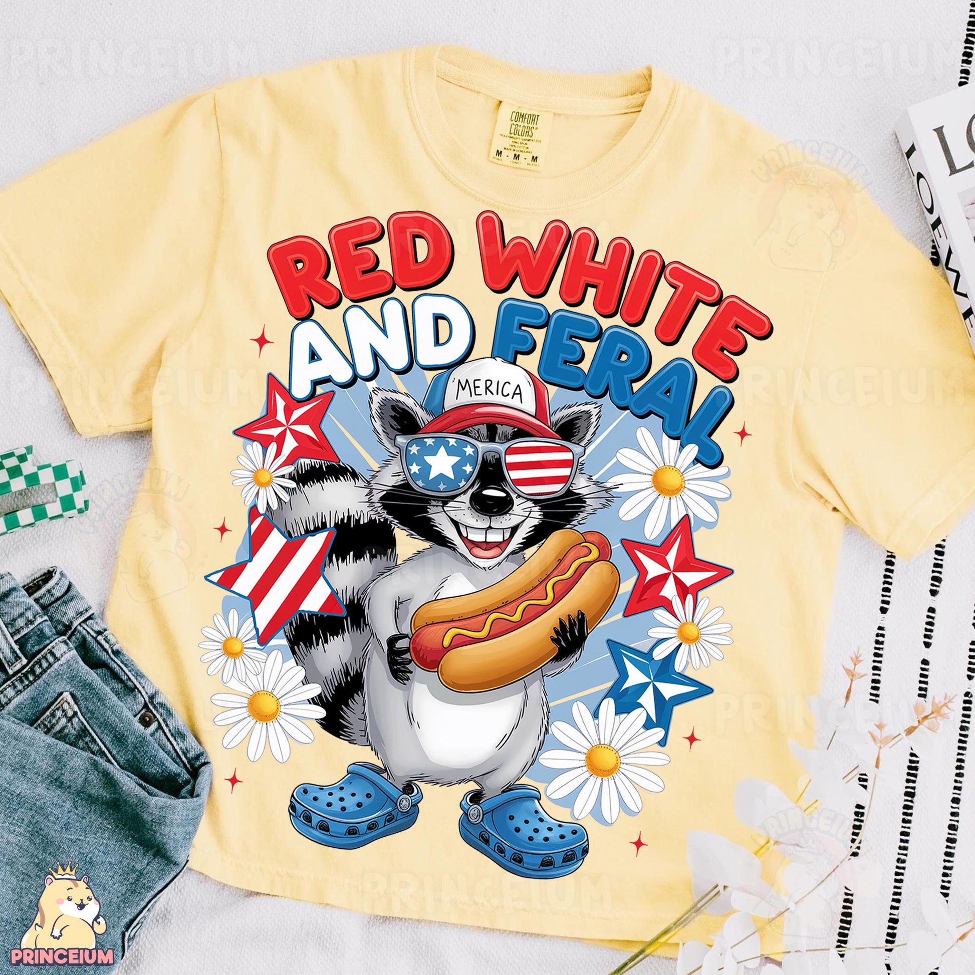 a shirt with a raccoon eating a hot dog