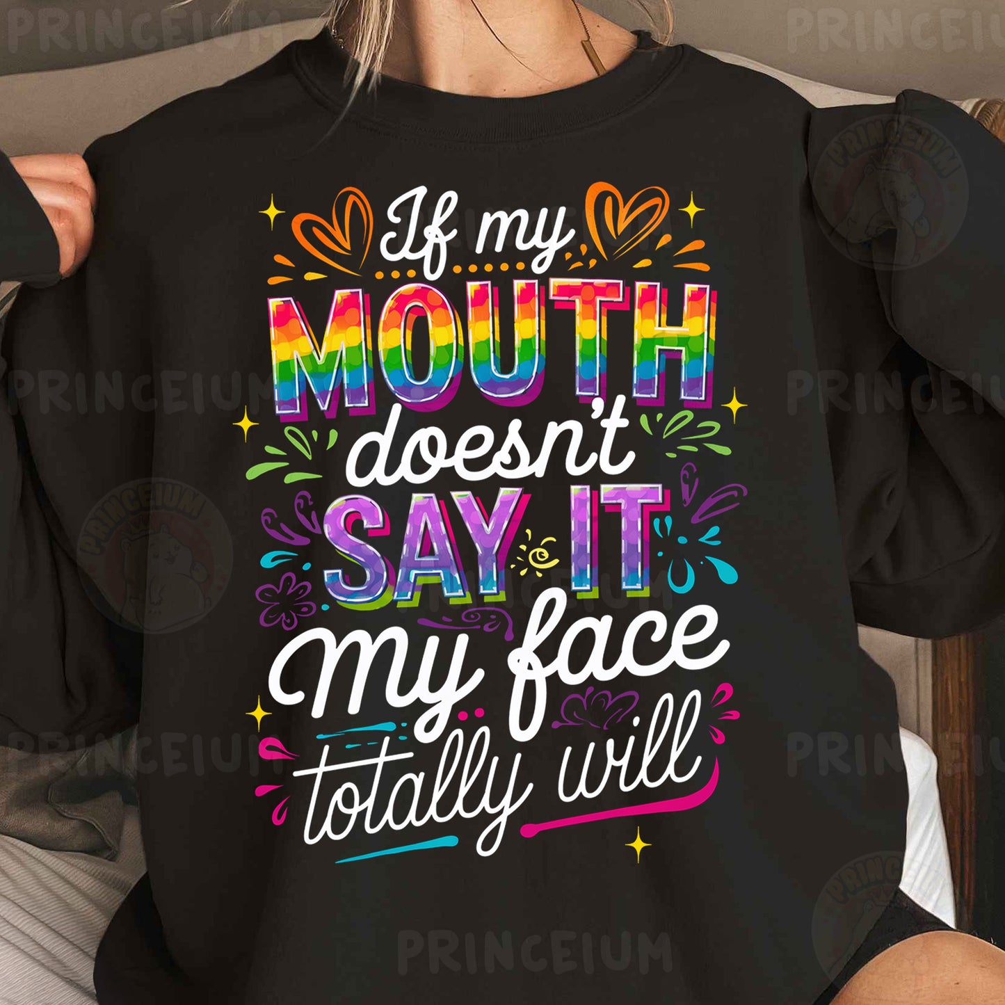 a woman wearing a black sweatshirt that says i'm my mouth doesn't
