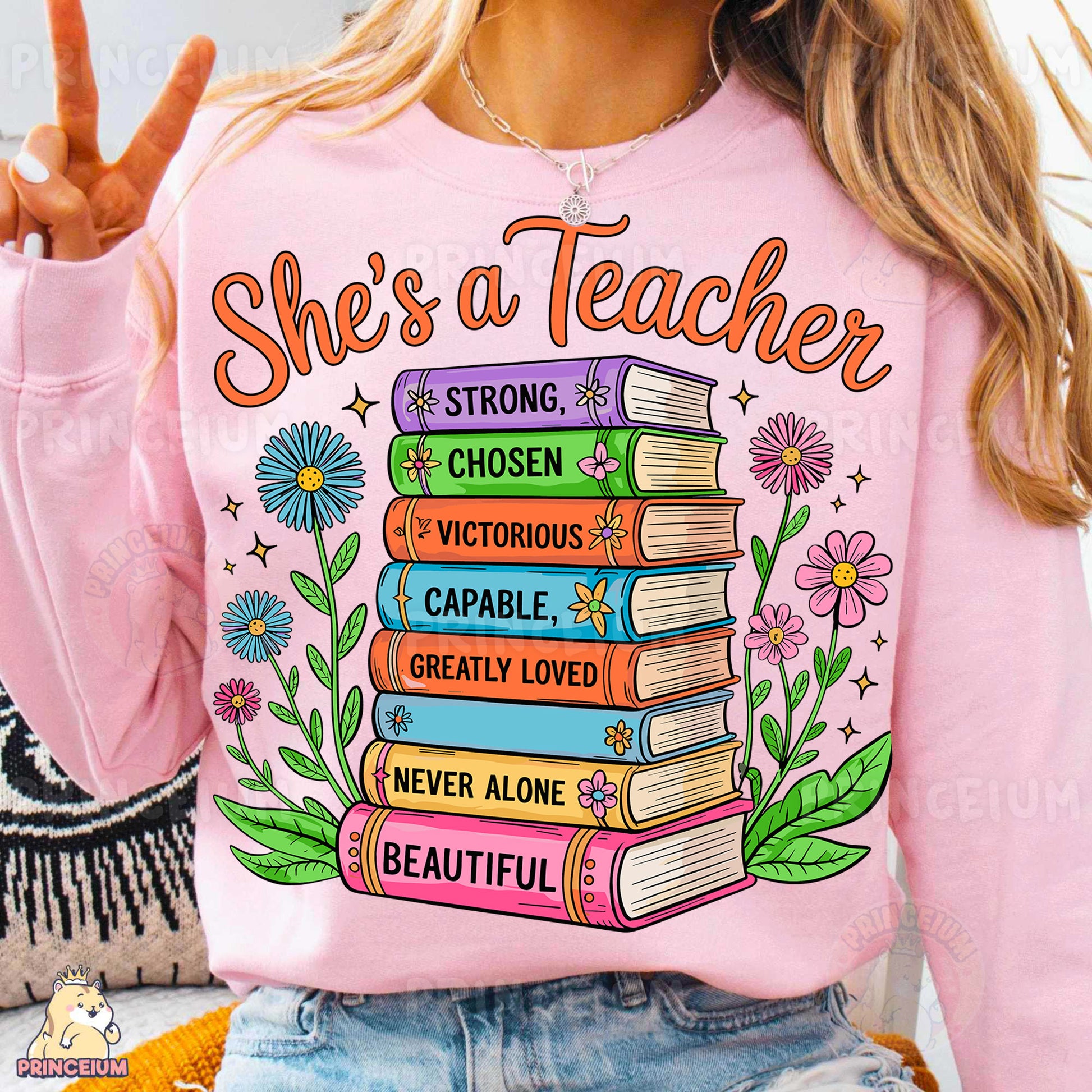 a woman wearing a pink shirt that says she's a teacher
