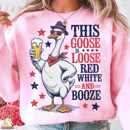 a woman wearing a pink shirt with a goose wearing a hat and holding a beer