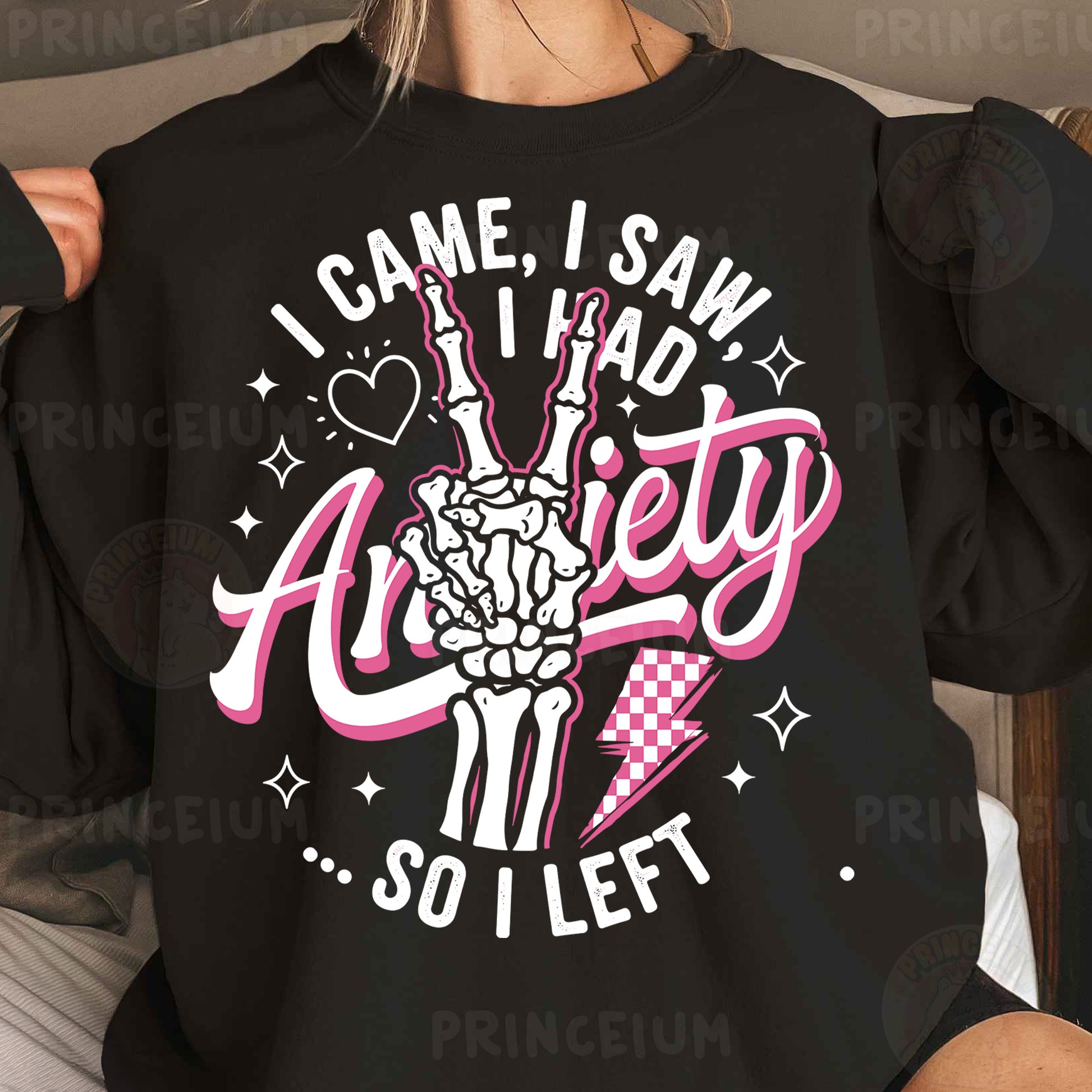 a woman wearing a black sweatshirt that says i came, i saw, i had