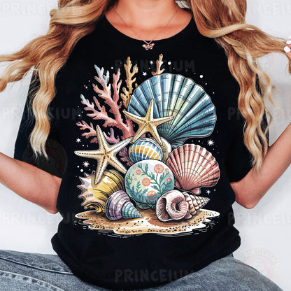 a woman wearing a black shirt with seashells and starfish on it