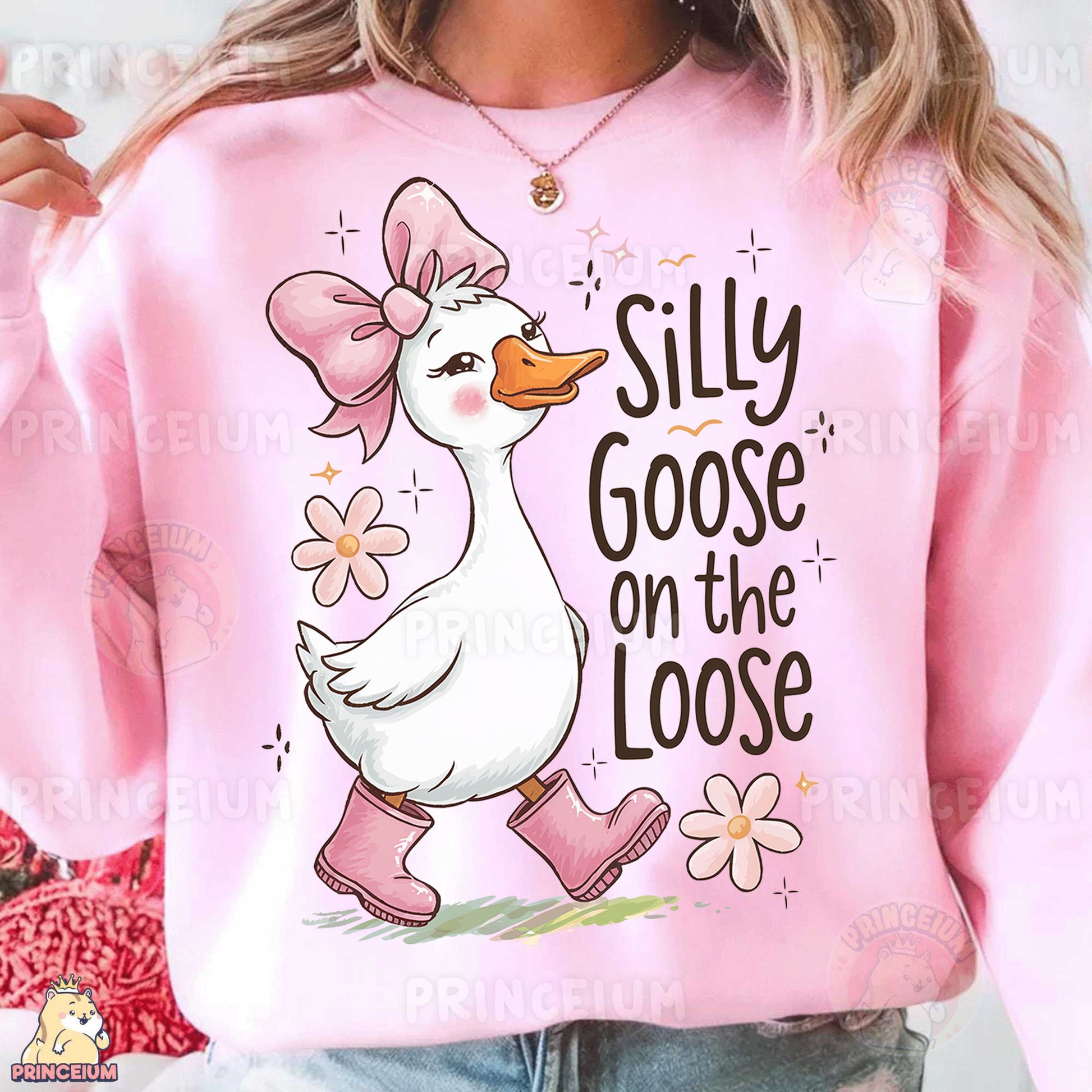 a woman wearing a pink shirt with a duck on it