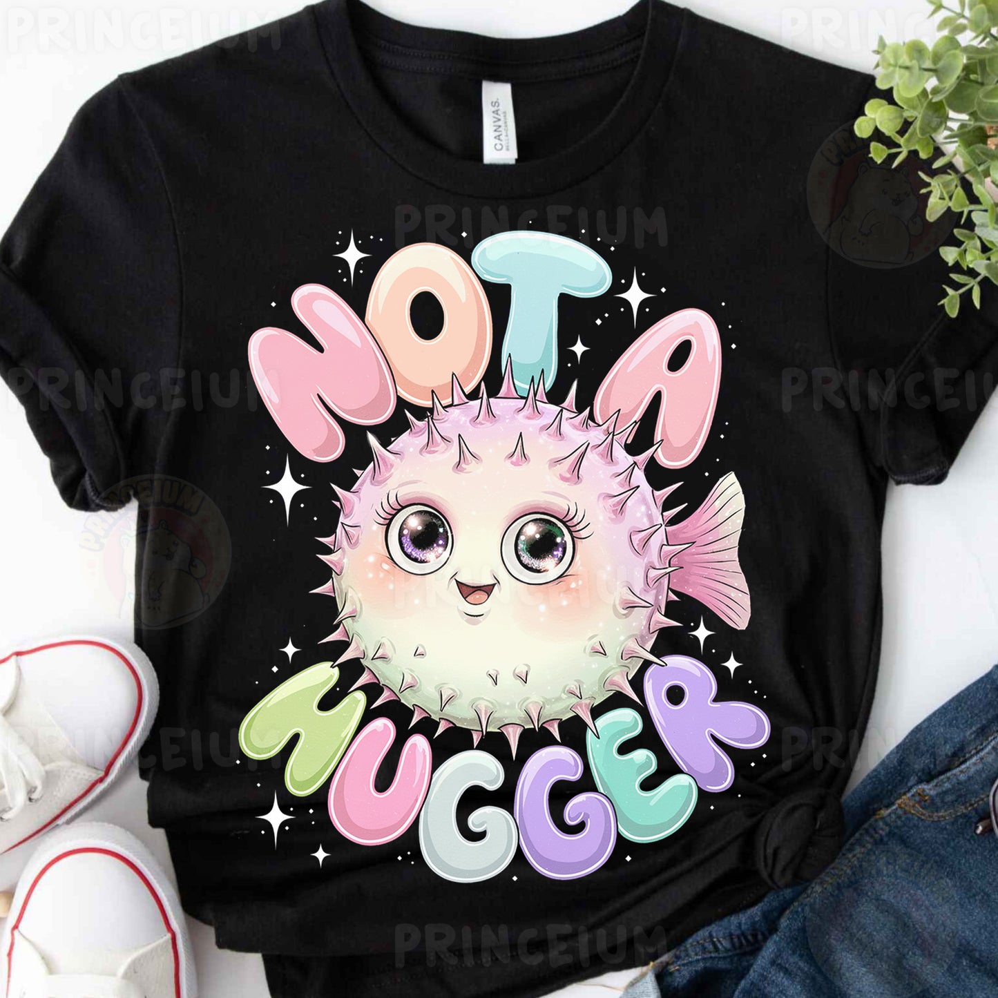 a black t - shirt with a pink puffer fish on it