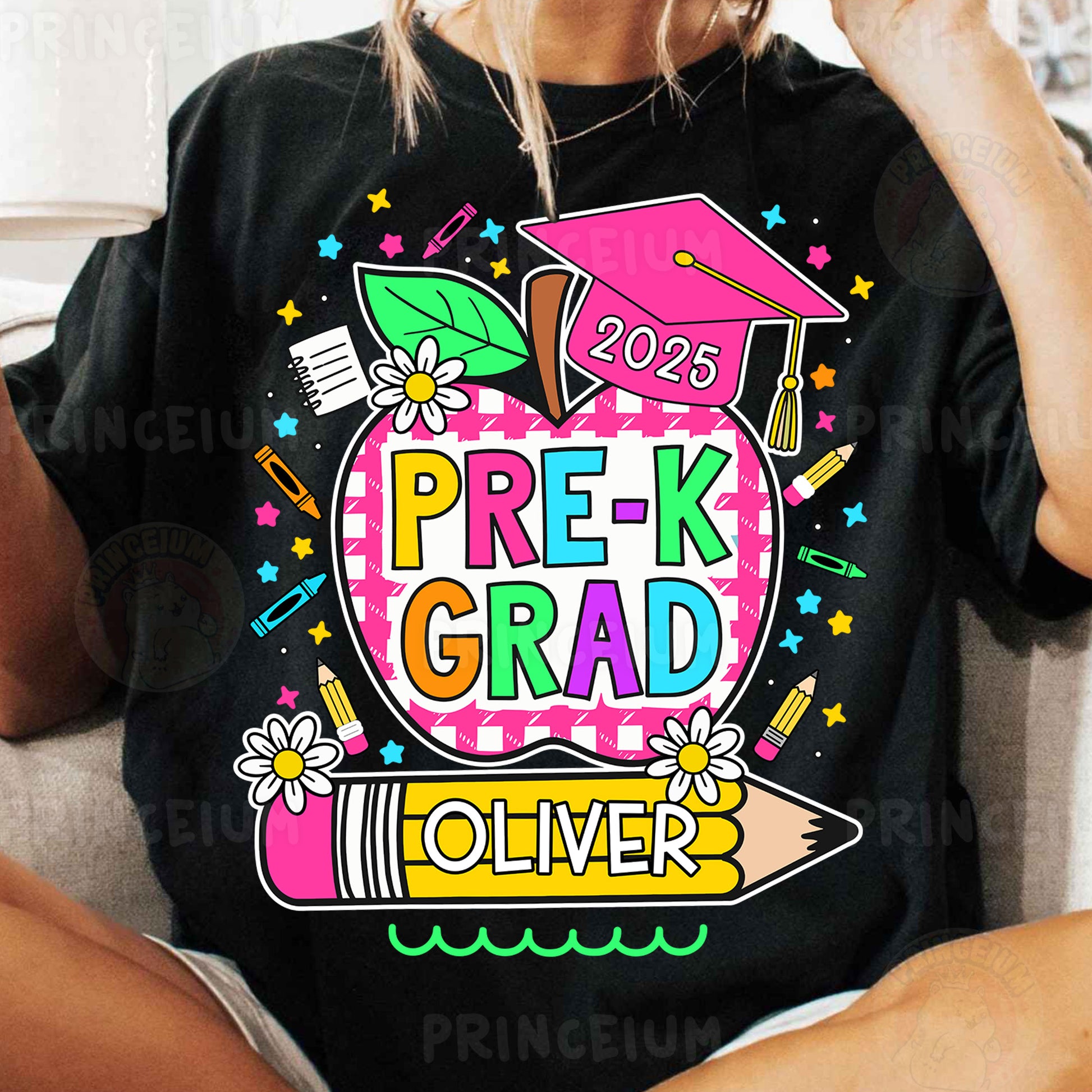 a woman sitting on a couch wearing a black shirt