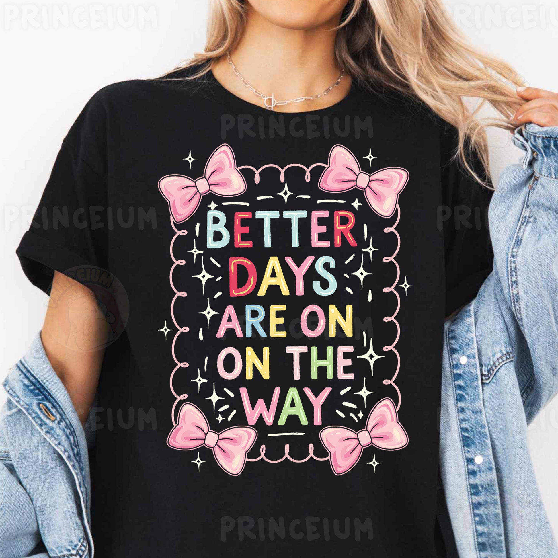 a woman wearing a black t - shirt that says better days are on the way