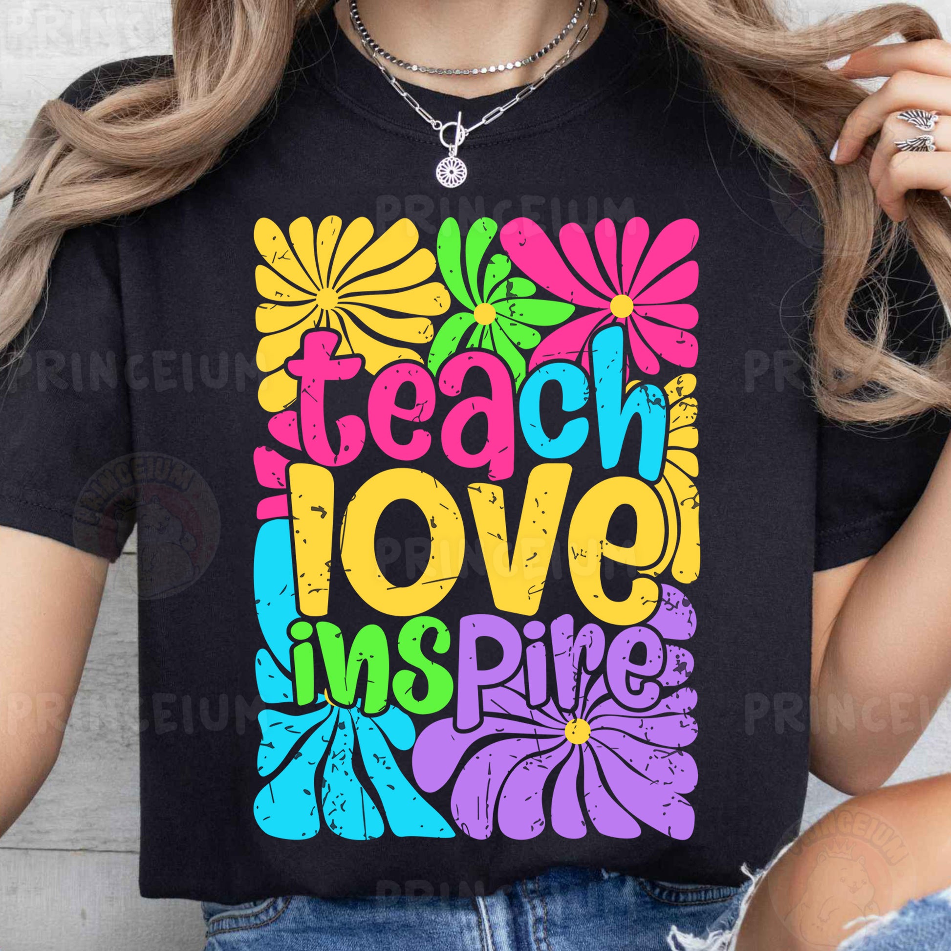 a woman wearing a t - shirt that says teach love is fine
