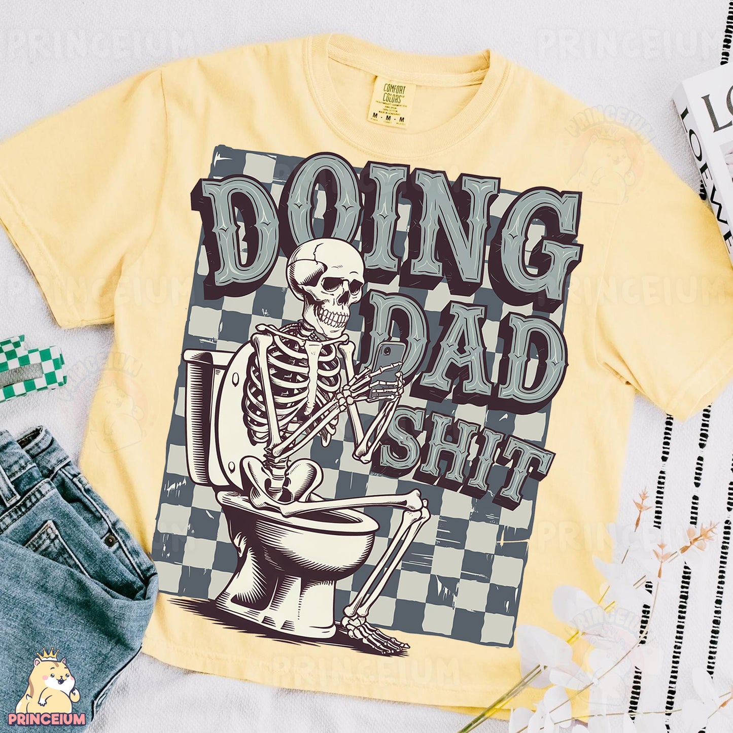 a t - shirt with a skeleton sitting on a toilet