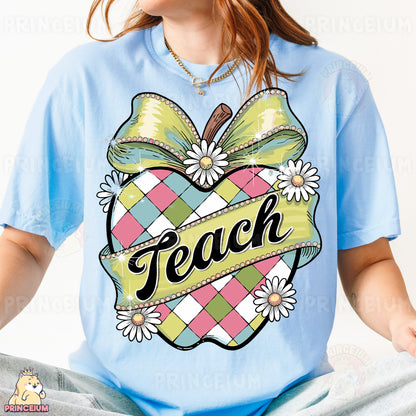 a girl wearing a light blue shirt with a bow on it