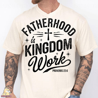 a man wearing a t - shirt that says fatherhood is kingdom work