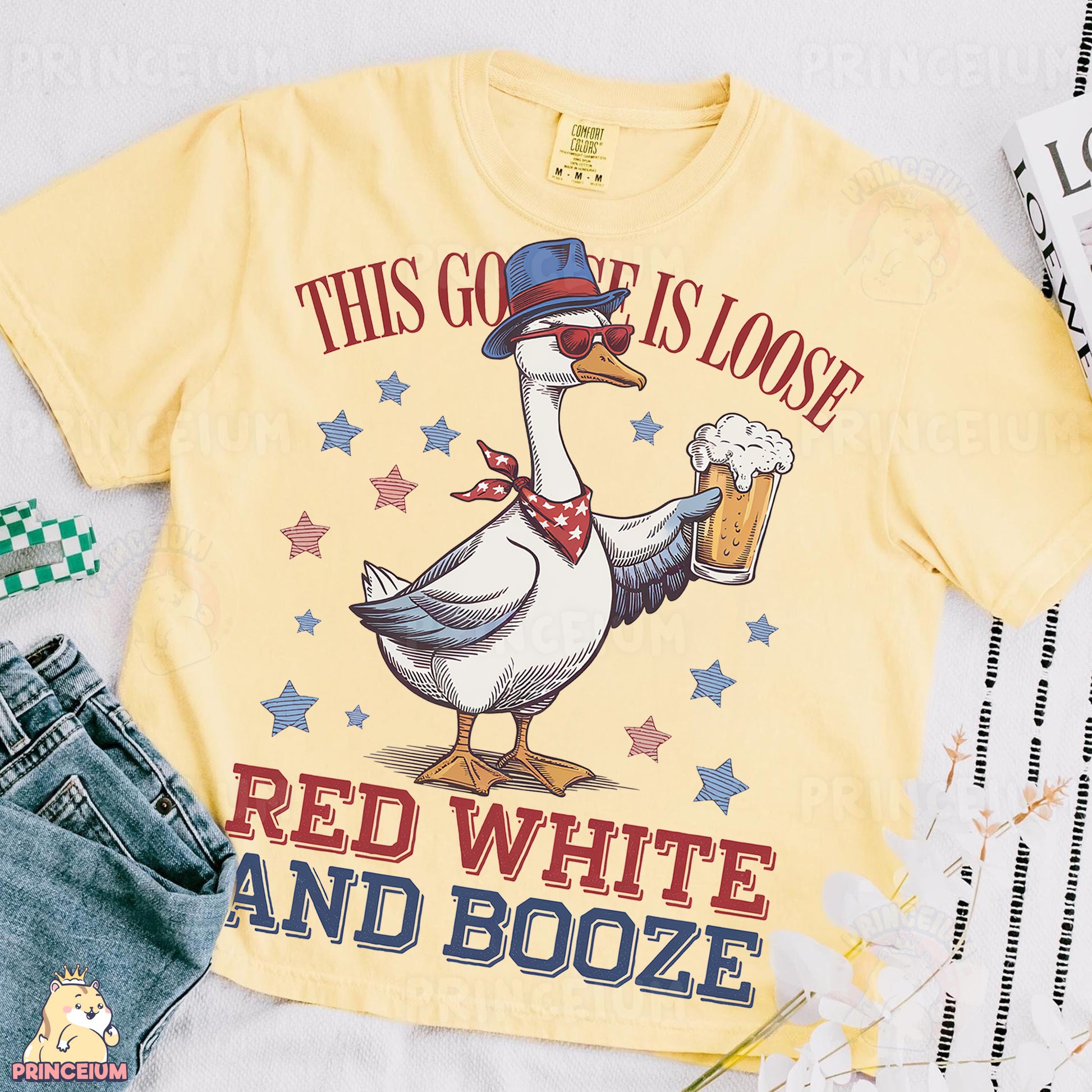 a yellow shirt with a goose wearing a hat and holding a beer