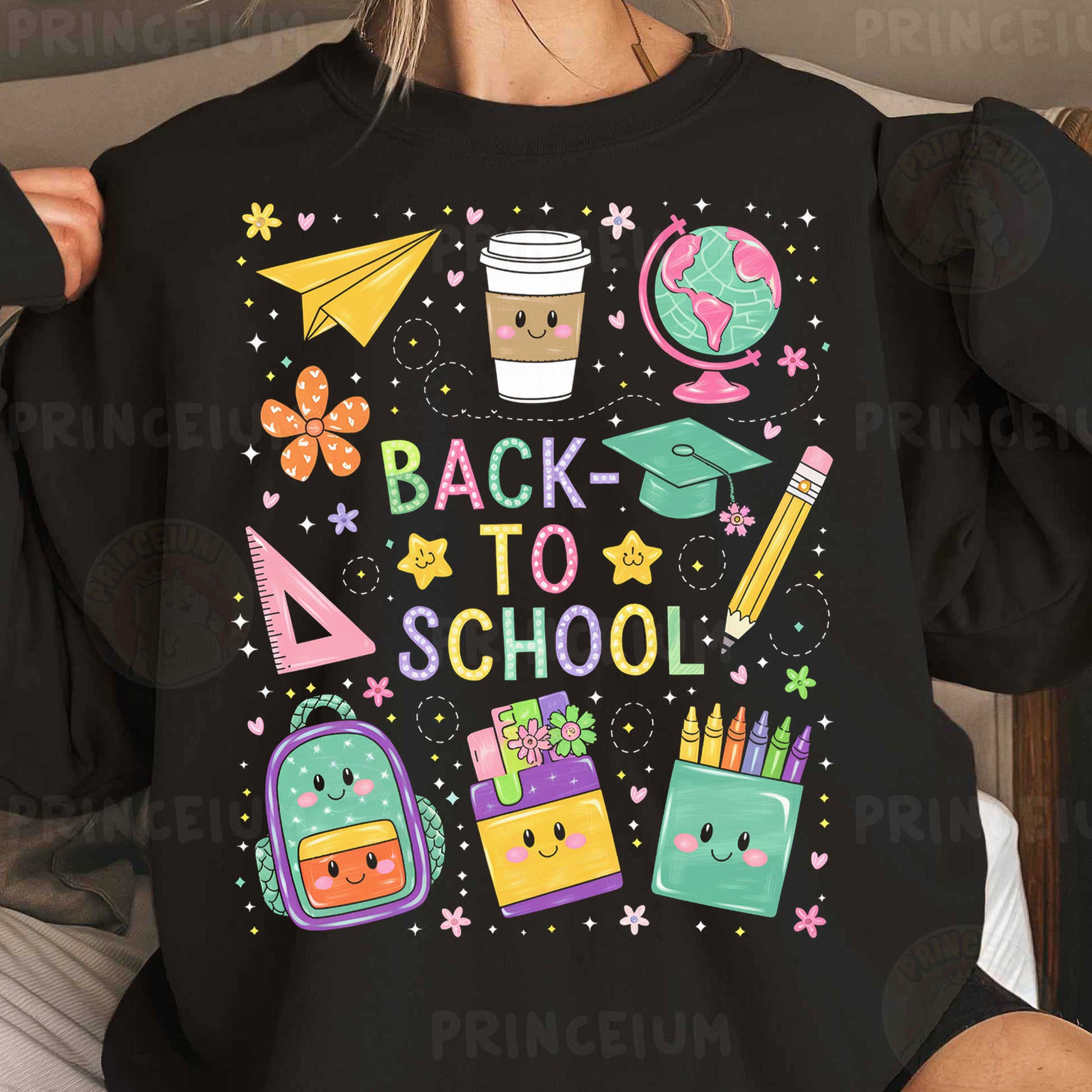 a woman wearing a black back to school shirt