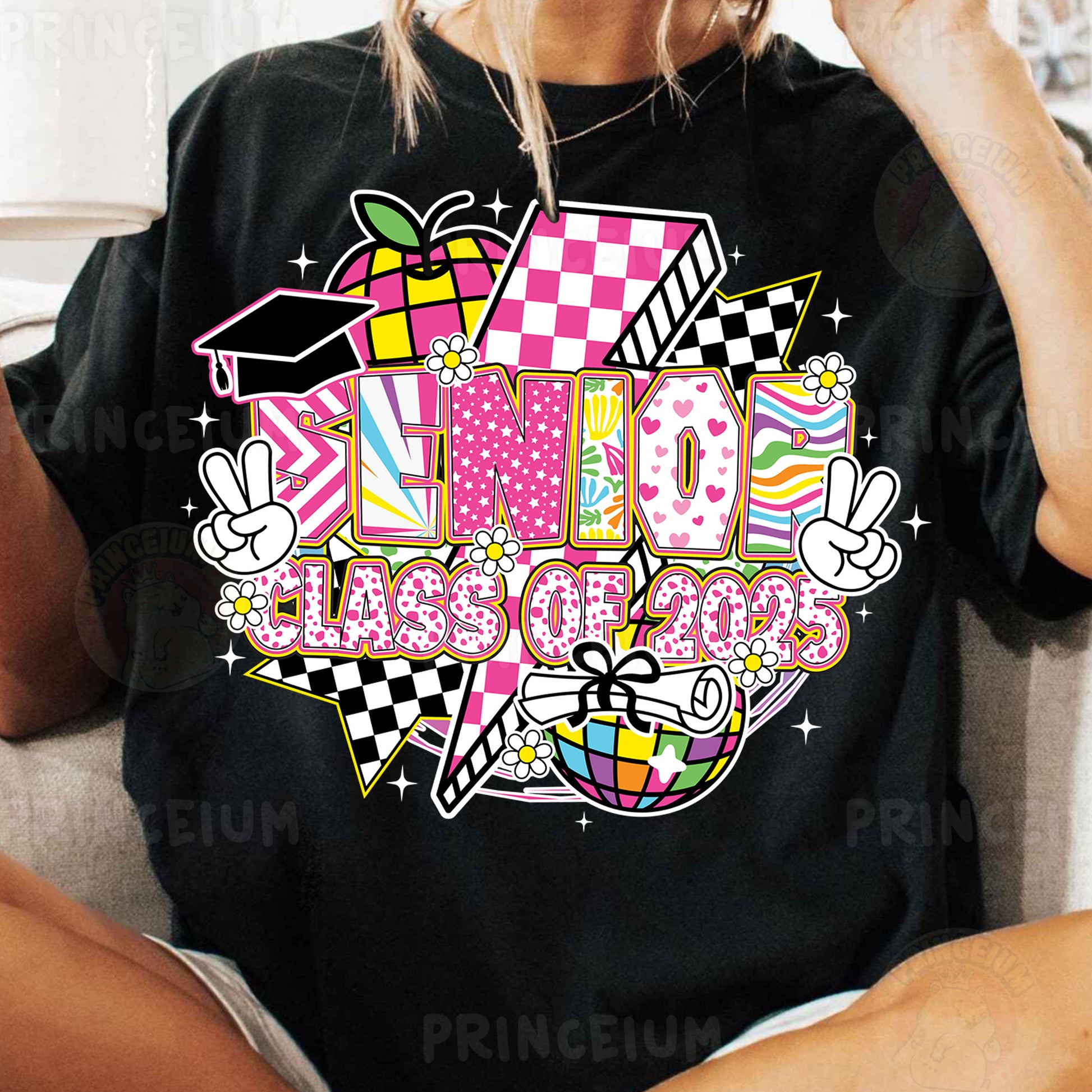 a woman sitting on a couch wearing a black shirt