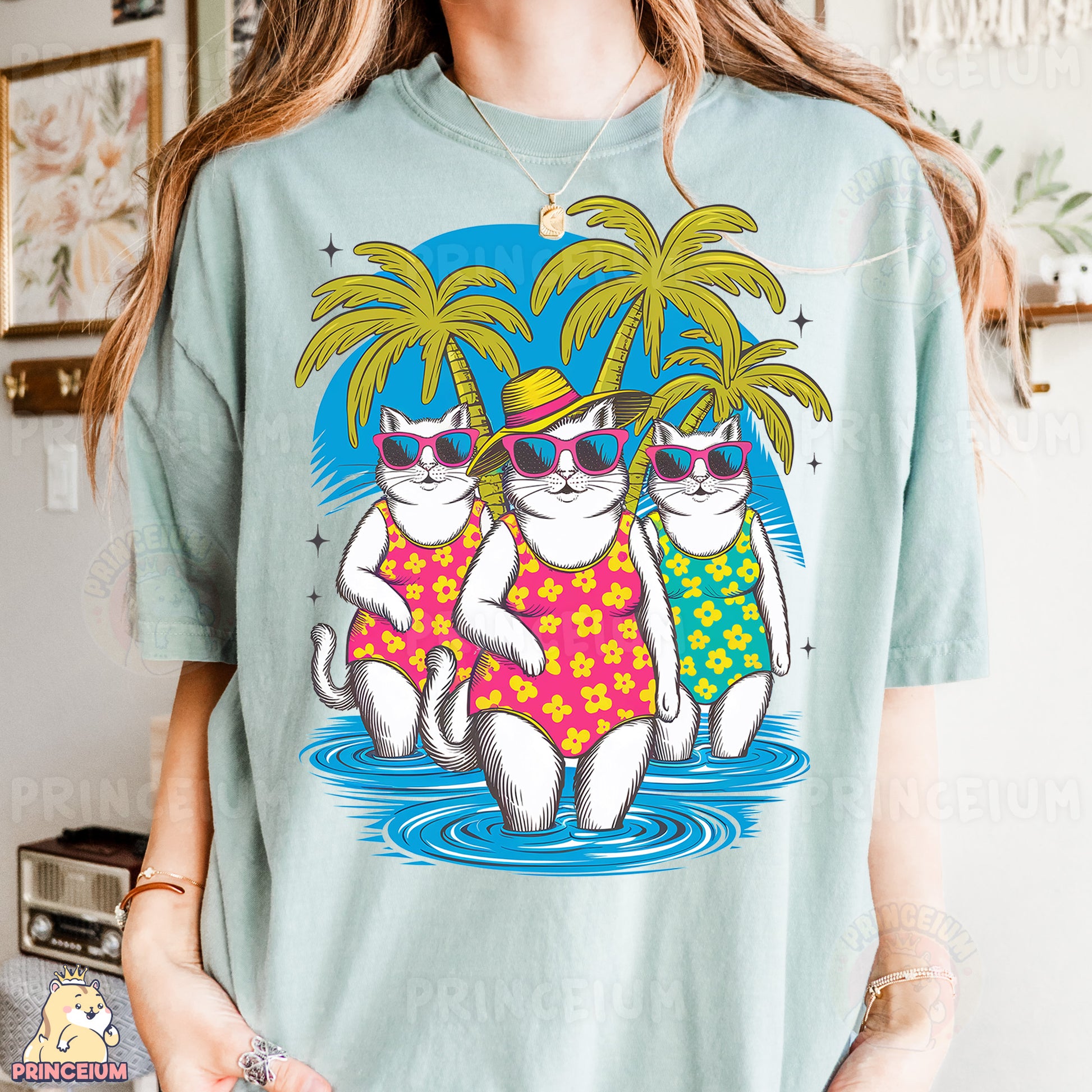 a woman wearing a t - shirt with two cats on it